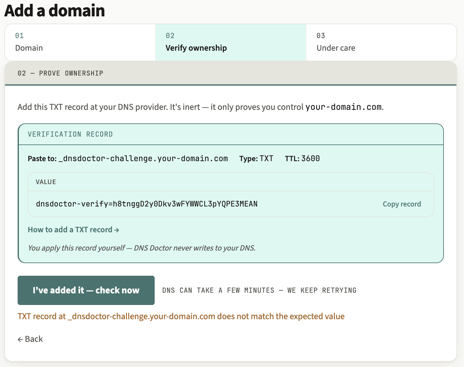 The ownership step showing the TXT record host and value to publish, with a copy button on the value.